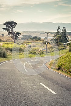 Coastal, rural landscape scene with road, Mahia Peninsula, East Coast, North Island, New Zealand