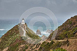 Coastal seaside landscape with lighthouse, Nugget Point, New Zealand