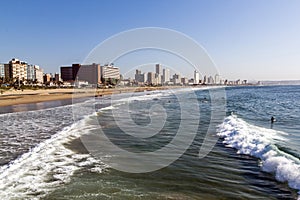 Coastal Shoreline against Blue Durban City Skyline