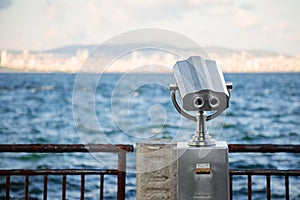 Coastal skyline with coin operated binoculars