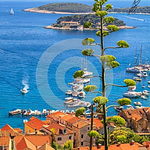 Coastal summer landscape - view of the City Harbour of the town of Hvar and Paklinski Islands