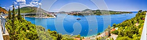 Coastal summer landscape - view of Dubrovnik from the side of The Franjo Tudman Bridge, overlooking the port of Gruz and the Lapad