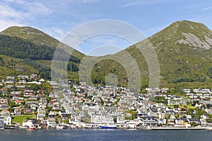 The Coastal Town of Maloy on the Island of Maloya on Norways mountainous west Coast photo