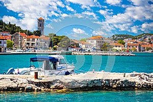 Coastal town of Tisno waterfront view, bridge to island of Murter