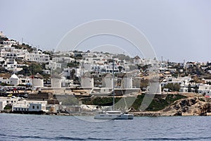 Coastal view of the Cyclades island of Mykonos with its famous windmills-Greece