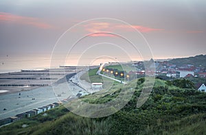 Coastal view over the village Zoutelande during twilight from one of the highest sand dunes in the Netherlands