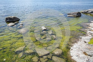 Coastal view of Porkkalanniemi, stones in the water and Gulf of Finland, Kirkkonummi, Finland