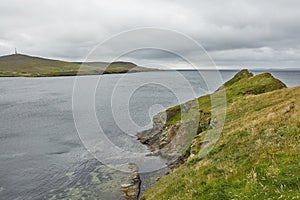Coastal view toward the Knab in Lerwick, which is the main port on the Shetland Isles, Scotland photo