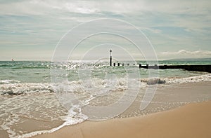 Coastal beach scenery along Bournemouth beach in Dorset.