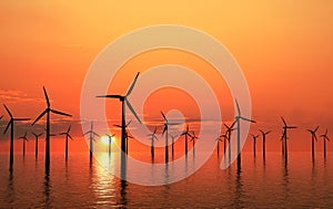 Coastal wind turbines sunset photo