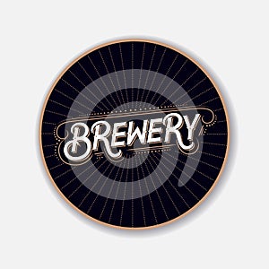 Coaster for beerl with hand written lettering.