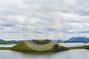 The coastline around the pond Stakholstjorn with pseudo craters - natural monument near Lake Myvatn in Northern Iceland