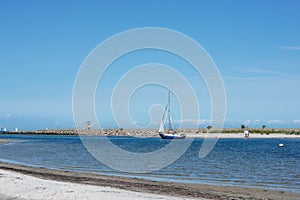 Coastline of the Baltic sea in north of Germany with sailing boat