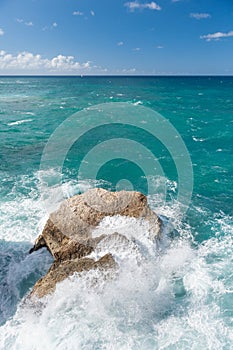 Coastline in Barbados. Rocks and Ocean Waves Sprays. Caribbean S
