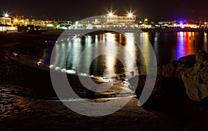 Coastline with Bay lights and buildings of the island of Crete Greece