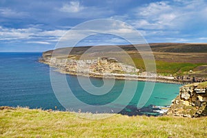 Coastline in Caithness, Scotland, UK on a calm, sunny day at the end of summer