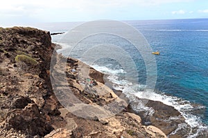 Coastline with cliffs at beach Playa de los Morteros on Canary Island Tenerife, Spain photo