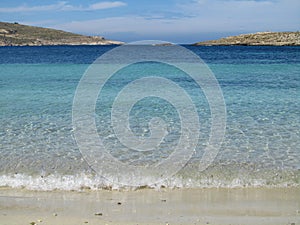 Coastline of Comino, Malta under a blue sky