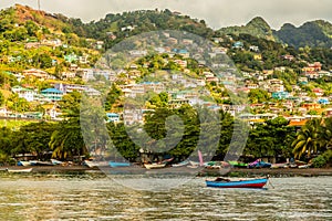 Coastline full of boats with lots of living houses on the hill, Kingstown, Saint Vincent and the Grenadines photo