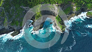 Coastline landscape with rocks and blue ocean with waves in Hawaii. Aerial view