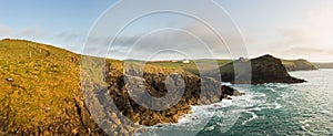 Coastline in late evening sun at Port Quin