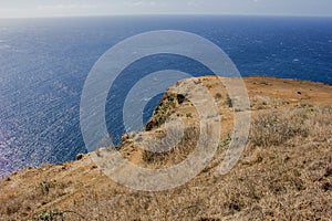 Coastline of Madeira with high cliffs along the Atlantic Ocean.