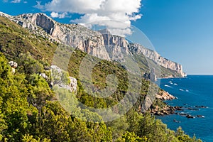 Coastline near Santa Maria Navarrese with rock pinnacle called Pedra Longa in the background Sardinia, Italy