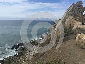 Coastline with ocean view and mountains