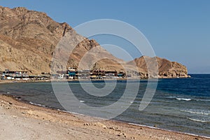 The coastline of the Red Sea and the mountains in the background. Egypt, the Sinai Peninsula. Coral reef Blue Hole