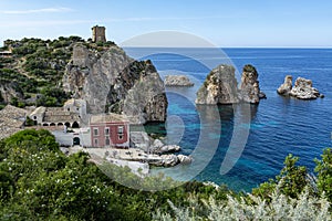 Coastline with rocks and deep blue sea near Castellamare del Golfo by entrance to natural reserve Zingaro, Sicily, Italy