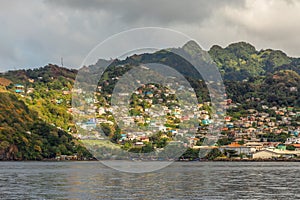 Coastline view with lots of living houses on the hill, Kingstown, Saint Vincent and the Grenadines photo