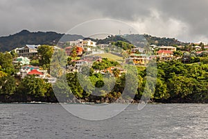 Coastline view with lots of villas on the hill, Kingstown, Saint Vincent and the Grenadines photo