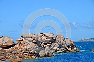 Coastline with well known pink rocks, Pink Granite Coast or Cote de Granite Rose in Brittany, France