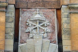 Coat of arms on the ancient gate Galliera in Bologna