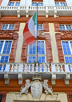 Coat of arms with lions and Italian flag, Palazzo Rosso, Genoa, Italy