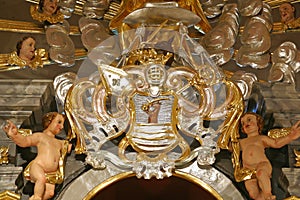 Coat of arms of the Petricevic family on the altar of St Florian Parish church of St George in Gornja Stubica, Croatia photo