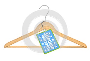 Coat hanger with lifetime warranty tag