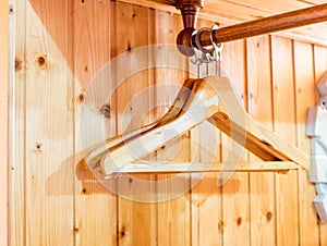 Coat hanger in wooden room