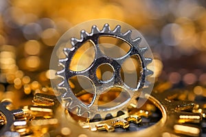 Coated petal cog in the middle of golden cogs