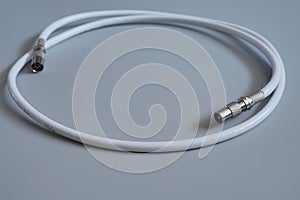 The coaxial cable is rolled into a ring