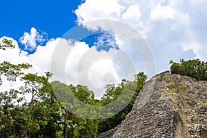 Coba Maya Ruins Nohoch Mul pyramid in tropical jungle Mexico