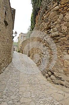 Cobbled alley in Girona village