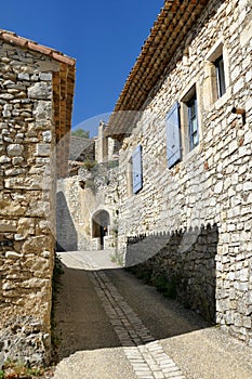Cobbled lane and stone houses in the medieval vill age of Marsanne in DrÃ´me ProvenÃ§ale