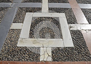 Cobbled and marble floor