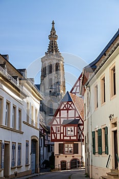 Cobbled road with historic houses and Schlosskirche in Meisenheim