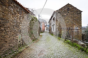 A cobbled street with antique houses in Barroca Village photo