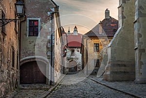 Cobbled Street with Historical Buildings in Old Town