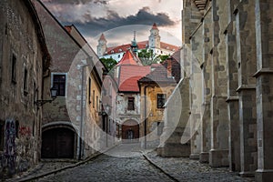 Cobbled Street with Historical Buildings in Old Town