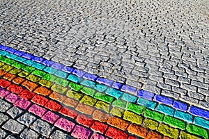 Cobbled street with rainbow