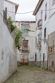 Cobbled street of the Sacromonte neighborhood in Granada, Spain